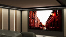 Cinema Interior - Richmond Fabric Walls - In this design we have combined Camira Blazer Lite Daydream with walnut finished backlit columns and rich dark paint on the walls